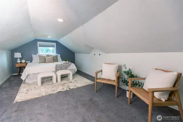 Huge finished attic space has freshly cleaned carpet & large walk-in closet, offering flexibility to use as bedroom or bonus room.