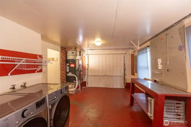 Another view of laundry/storage/garage.