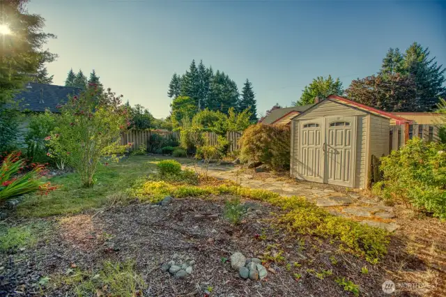 Even more storage is offered by this yard shed - the mature landscape in every direction is so beautiful!