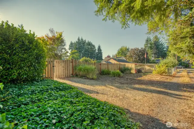View of the vehicle gate from the alley behind property.