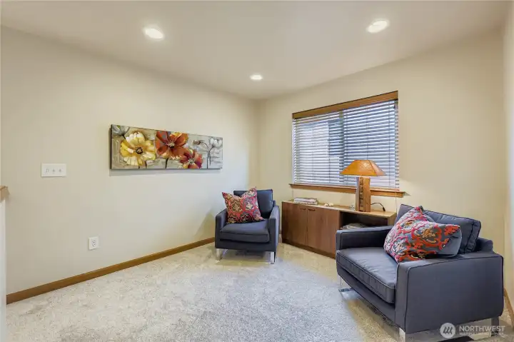 Large Bonus room at the top of the stairs. Library, Den, Music Room...whatever your heart desires!