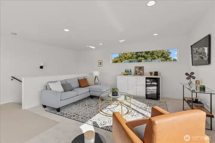Kick back and watch movies - wet bar included!
