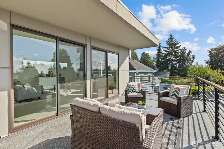 Wall of sliders opens to view deck