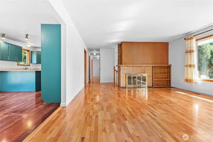Upstairs living looking into kitchen/dining