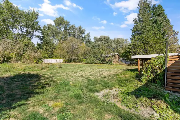 .66 acres partially fenced with fruit trees