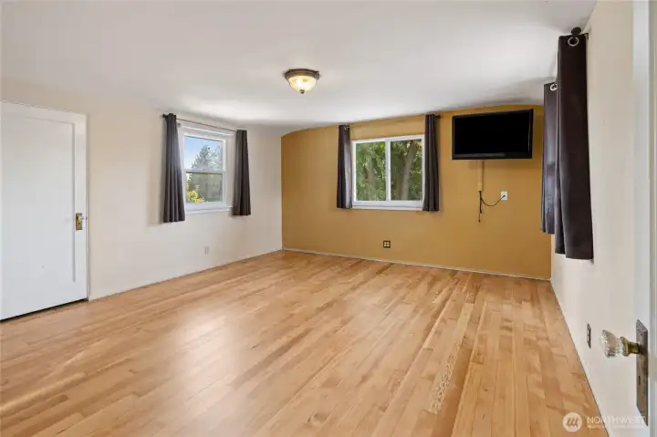 Primary Bedroom w/newly refinished wood floors