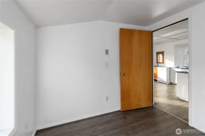 Vinyl plank flooring throughout means beach days won’t leave a trace—durable, stylish, and made for coastal life.