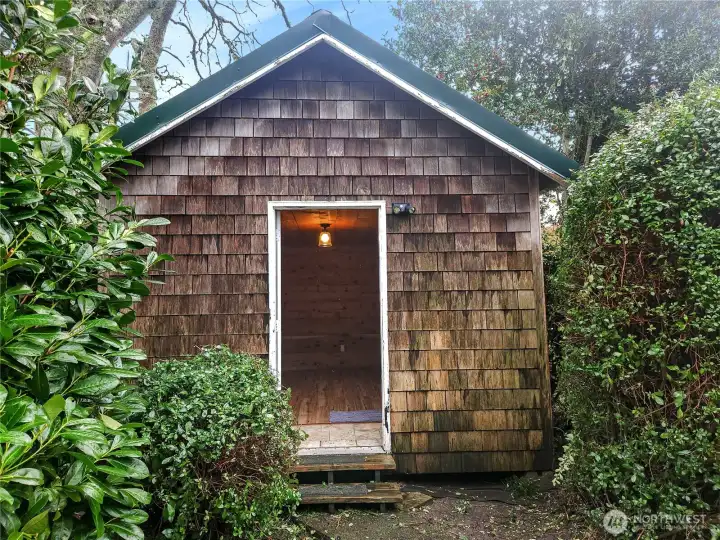 The cutest little space tucked away in the back—perfect for painting, working, or hosting extra guests!"