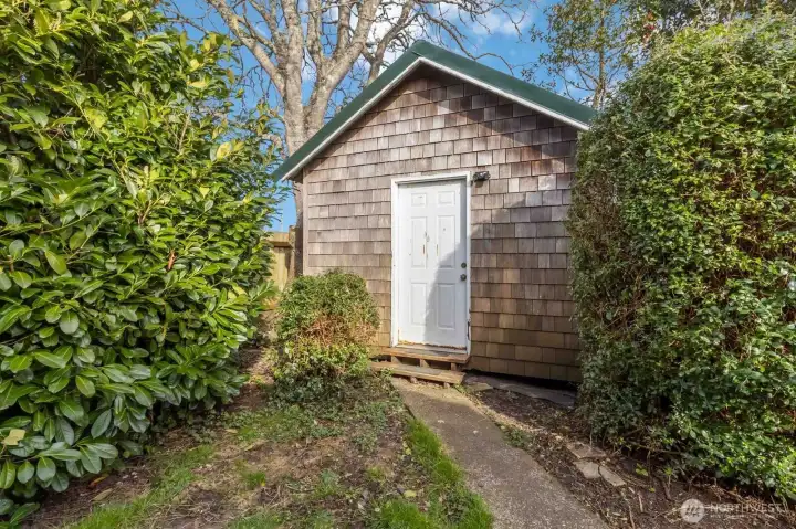 The cutest little space tucked away in the back—perfect for painting, working, or hosting extra guests!