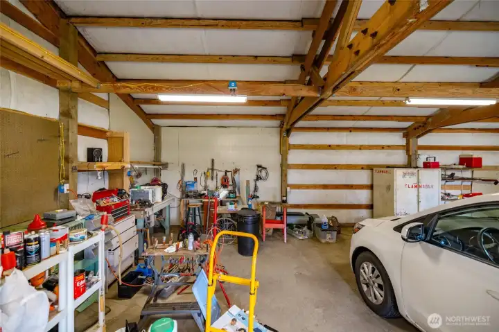Shop is deep and wide, Seller is leaving the tools and riding lawn mower.