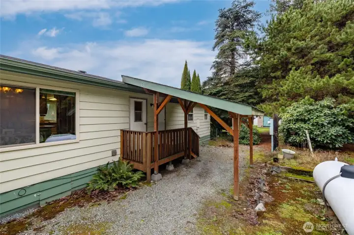 Back door is covered and has a deck.