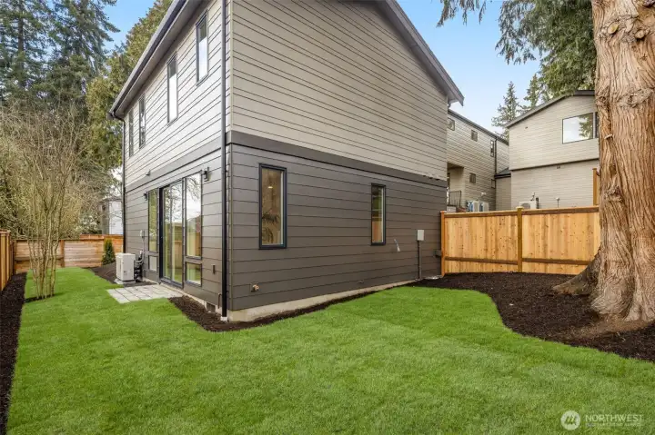 Fully fenced and freshly landscaped yard.