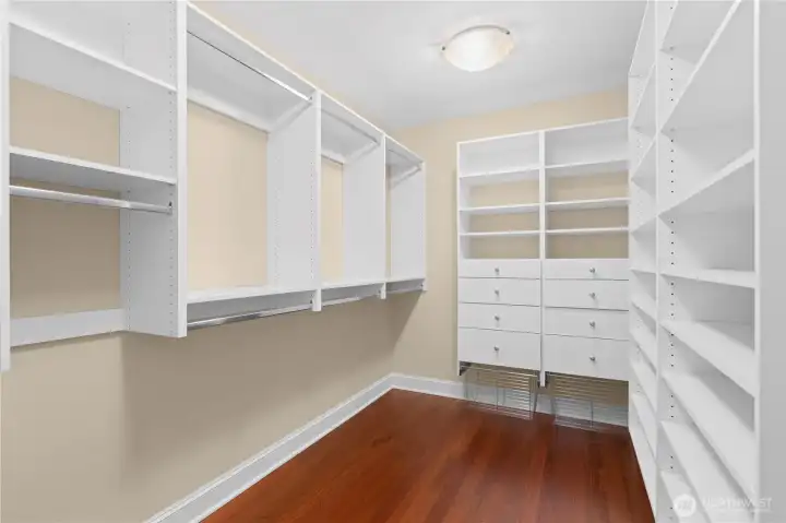 Primary bedroom walk-in closet.