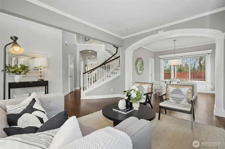 A lovely living area anchored by clean lines and natural light.