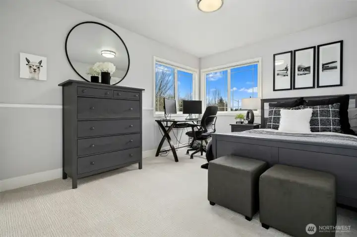 Thoughtful full-size bedroom with comfort + functionality in mind.