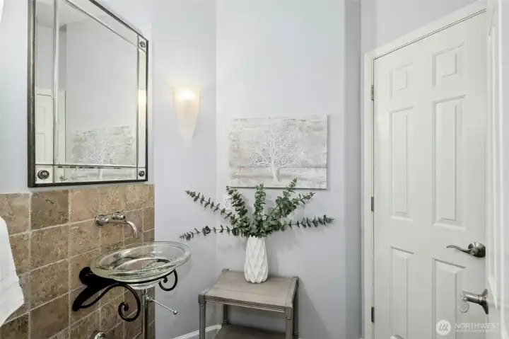 Powder on main floor with ample space for expansion.