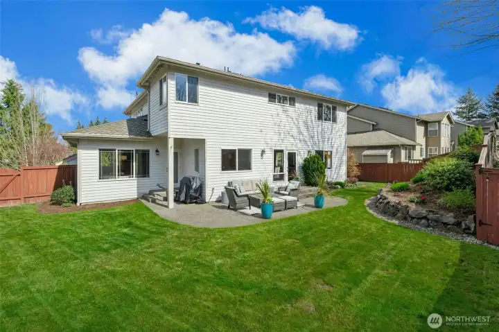 Fully fenced back yard backing to trails + open space.