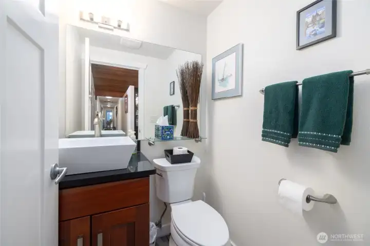 Half bath off the entryway and family room.