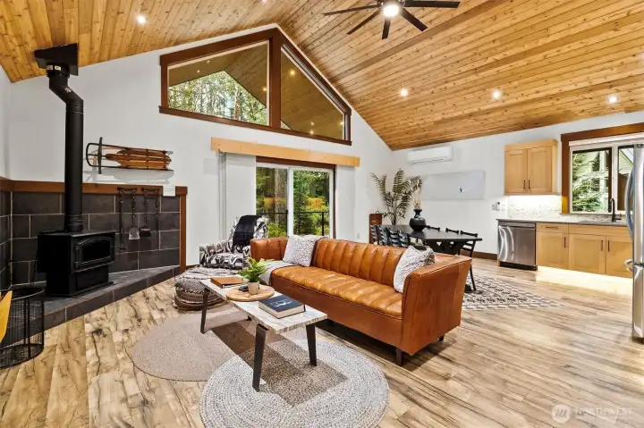 Living area with large windows and natural light.