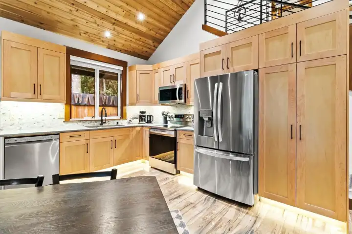 Kitchen with stainless steel appliances.
