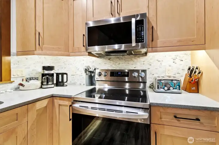 Kitchen detail with range and microwave