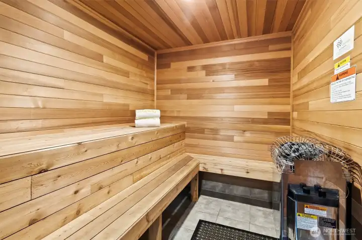 Custom sauna with warm wood finishes for relaxation and wellness.