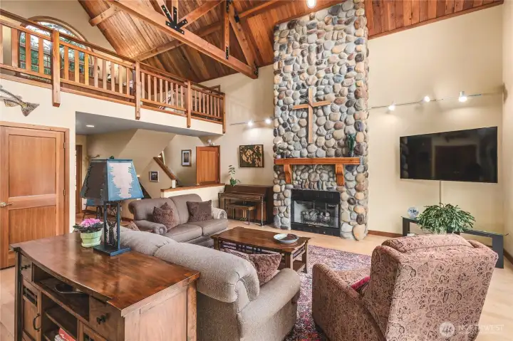 River Rock Fireplace - originally constructed as a wood fireplace but converted to gas log - could be used as either