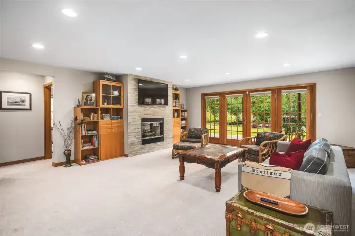 Family Room with French Doors to Patio and Gas Fireplace which could be converted back to wood