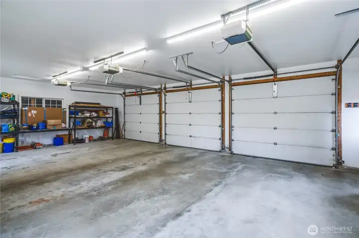 3 Car Finished Garage Plus Another Small Building that houses garden tools