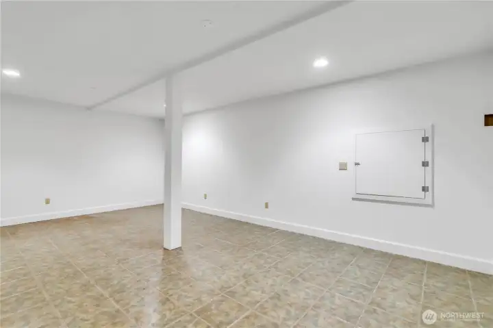 Between the main floor and the basement there is a mid-level room that is approximately 350 sf. Flexible space for a home gym, media room, wine cellar, prepper's bunker? What will you do with this storage space?