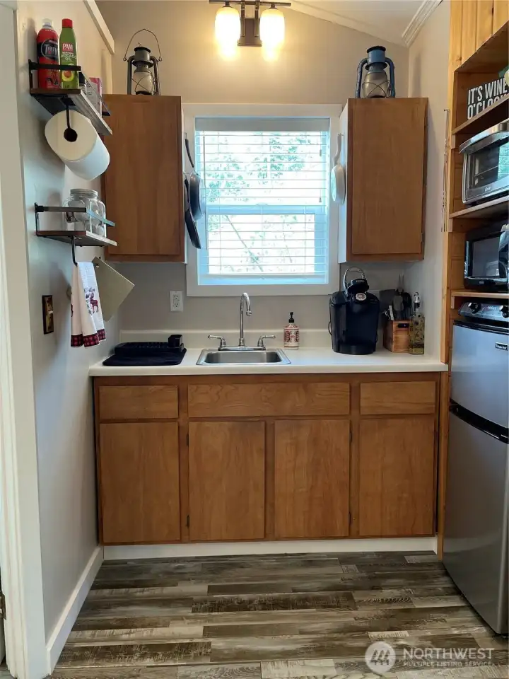Cute kitchen with all of the essentials.