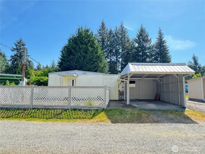 Carport with shed.