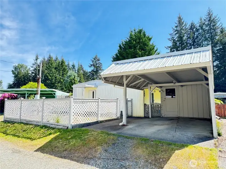 Carport with shed.