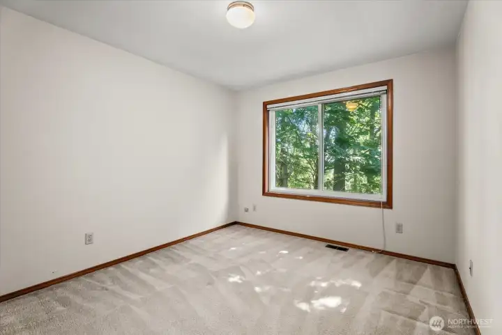 bedroom facing backyard