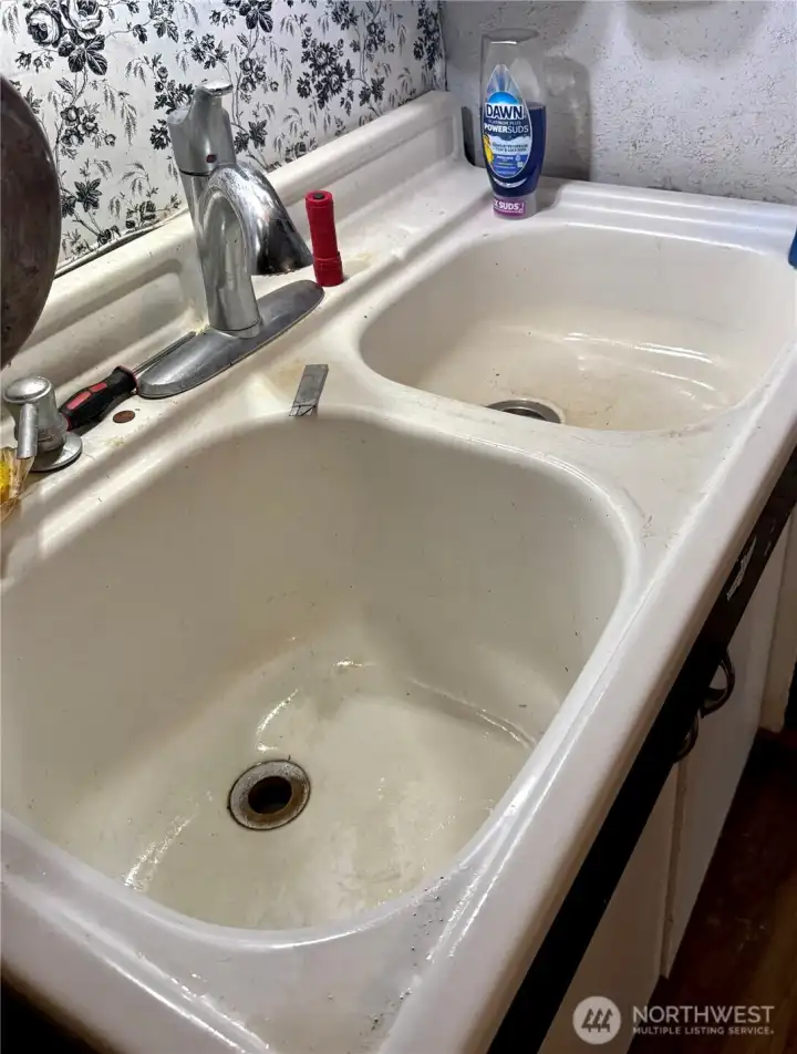 Unique sink with one side deeper and one shallow