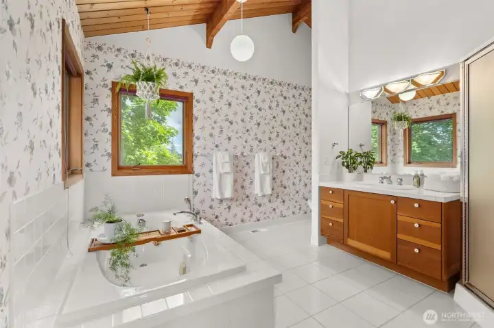 Primary bathroom with jetted soaking tub. Primary bathroom with jetted soaking tub.