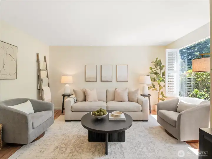 Designed for connection and relaxation, this inviting living room is filled with natural light and tranquil outdoor views.