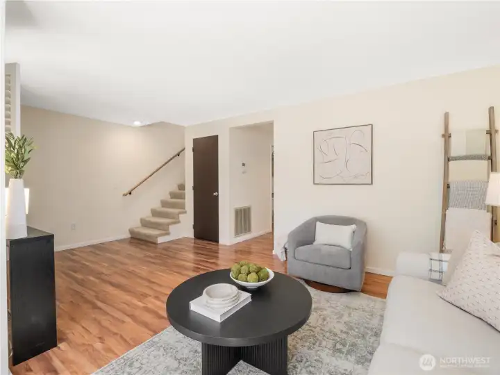 Balancing comfort and functionality, this inviting living area offers ample space to relax, entertain, or simply enjoy everyday moments.
