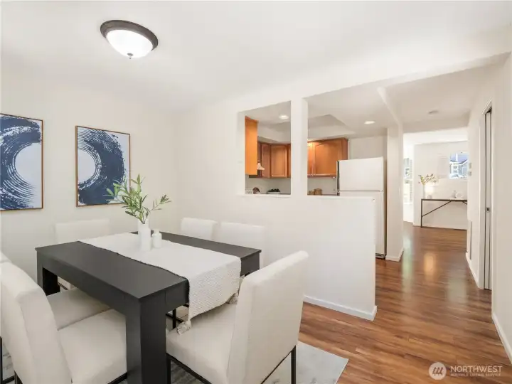 Seamlessly connecting the dining area and kitchen, this inviting space makes everyday meals, weekend brunches, and casual entertaining feel effortless.