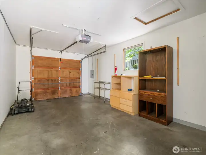 More than just parking, this attached garage offers valuable space for storage, hobbies, projects, or seasonal gear.