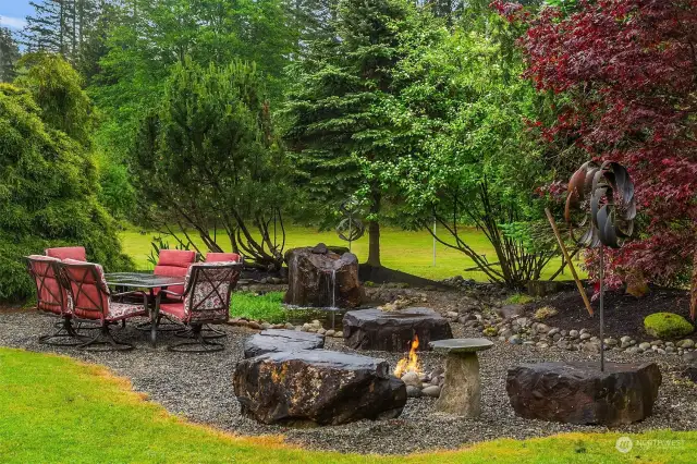 Backyard off the living room with firepit and fountain