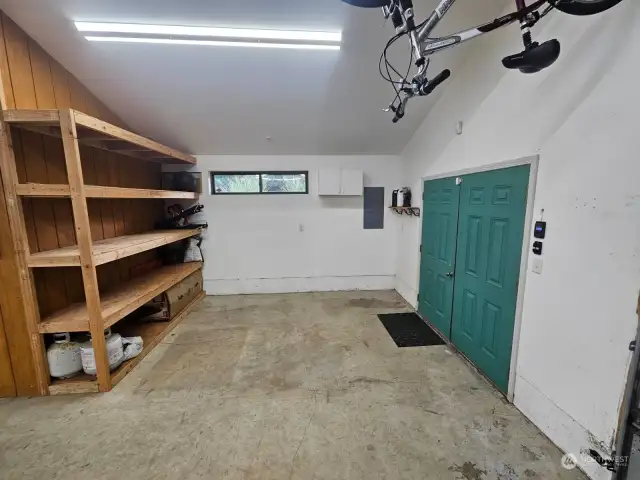 Storage area on street side when entering through the shop doors.