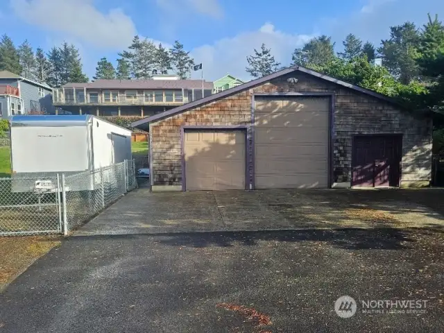 View up to the house from the shop with access from I Place.