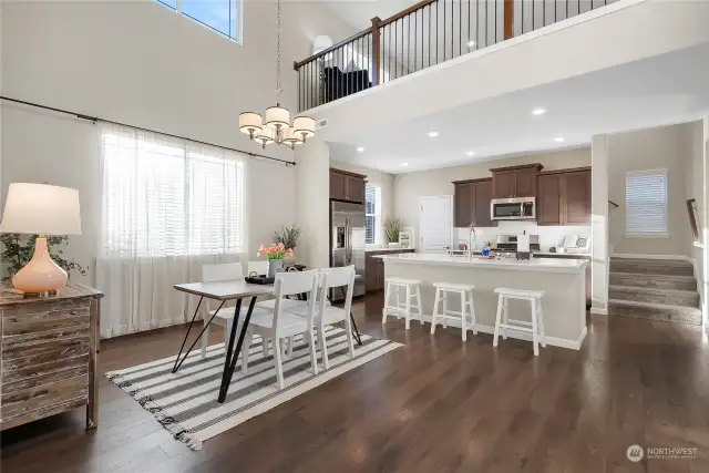 Kitchen with breakfats bar and dining room