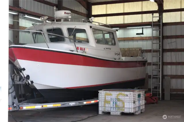 Boat inside shop is 27' (boat not included in sale)