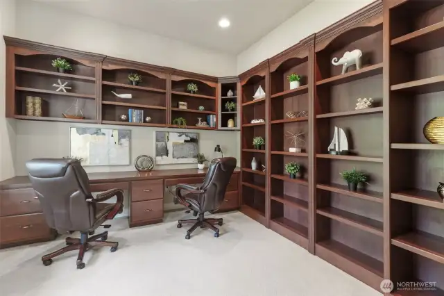 Custom cherry wood built ins with desk seating for two