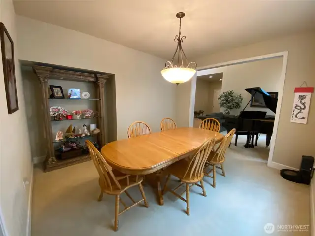 Photo taken by Seller prior to Tenant Occupancy.  Formal dining area accessible from the kitchen through the butler's pantry with granite tiled counters