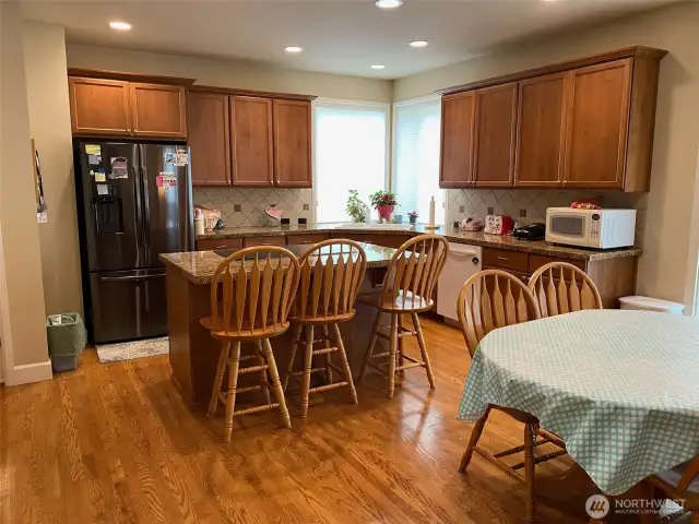 Photo taken by Seller prior to Tenant Occupancy. Lovely kitchen with granite tiled counters