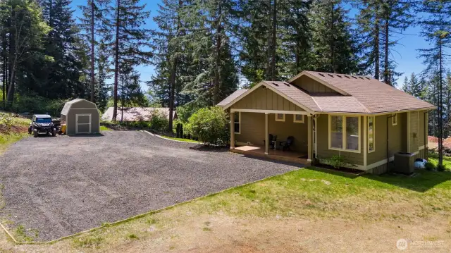 Back of the house, tons of parking, RV/Boat parking at the entry of the property