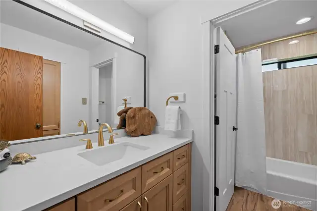 A totally NEW bathroom, the last old thing to be renewed has been, making this home ready to enjoy as soon as you get here.